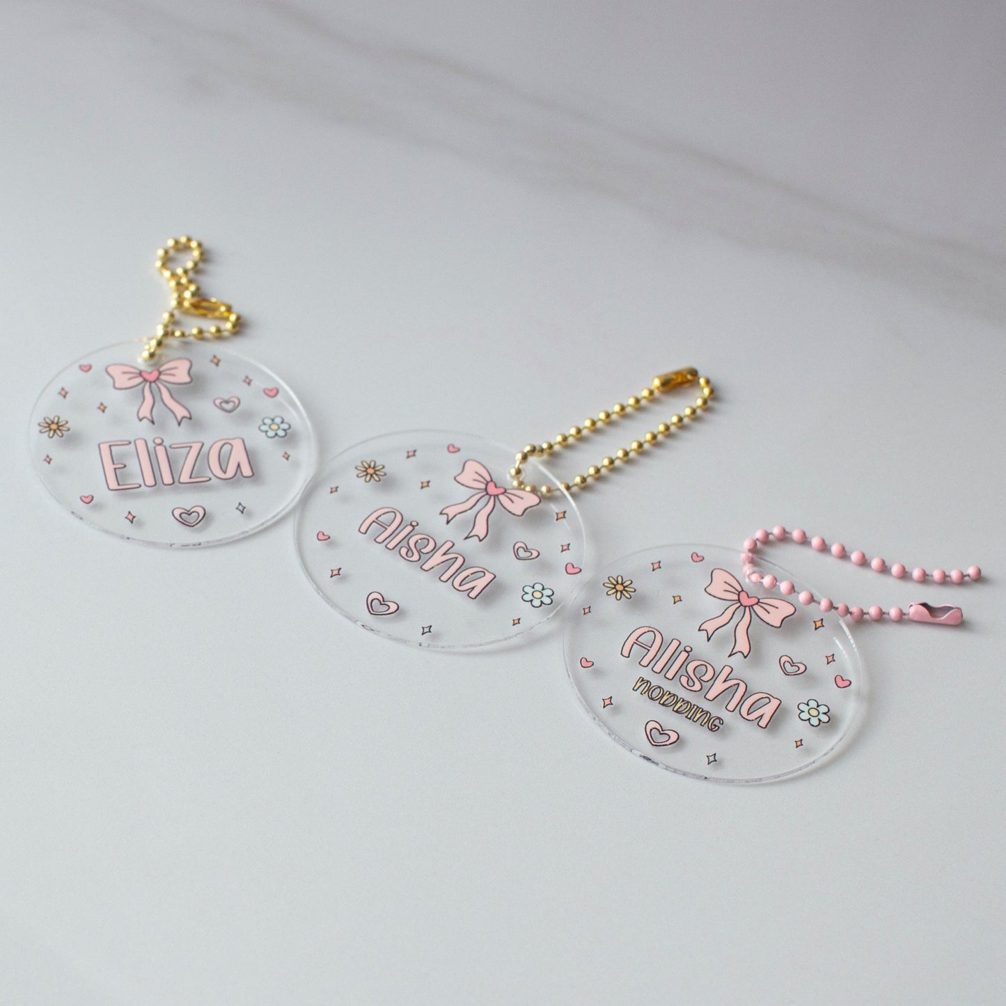 Personalised Acrylic Backpack Tag – Pretty Bow custom name labels for kids bottles lunchbox waterproof NZ - Chlosha creations