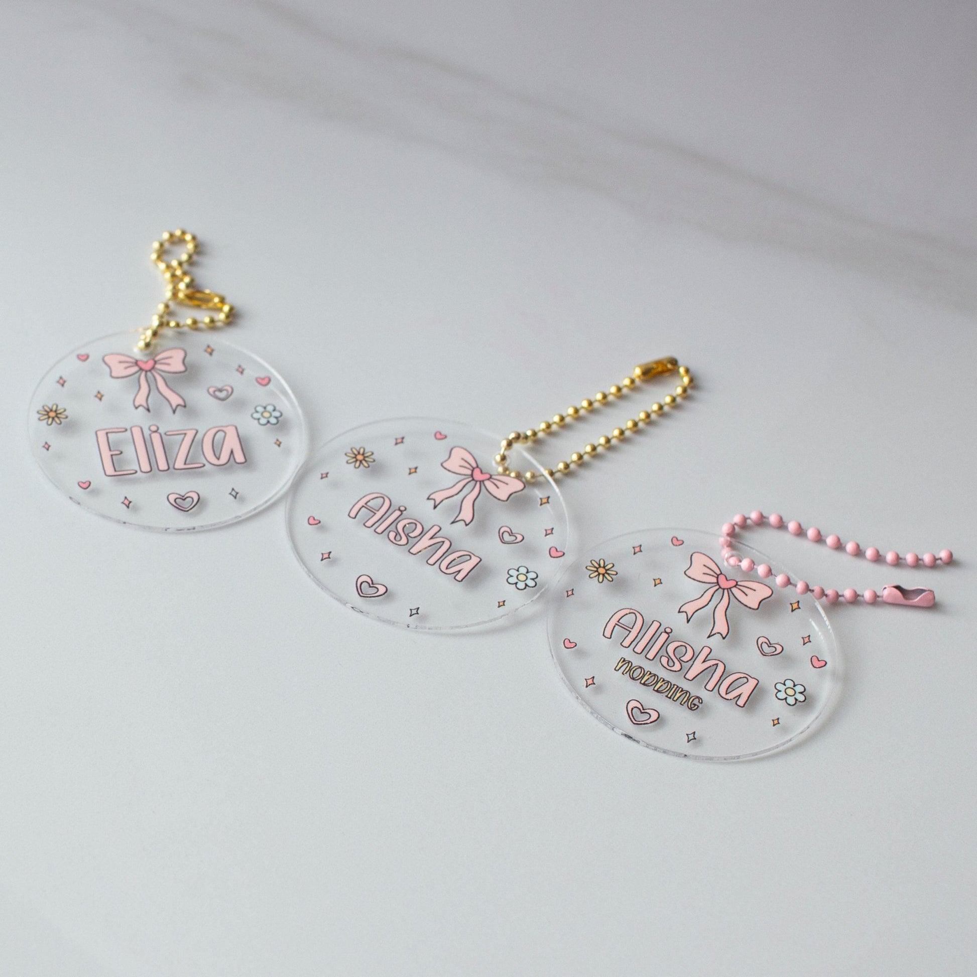 Personalised Acrylic Backpack Tag – Pretty Bow custom name labels for kids bottles lunchbox waterproof NZ - Chlosha creations